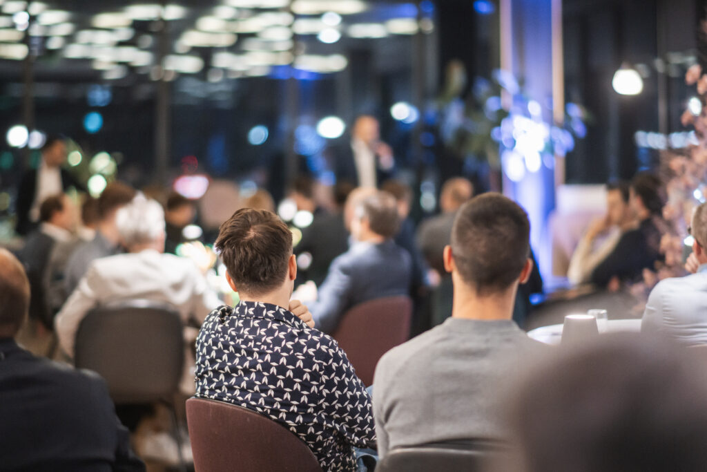 Blurred image of businesspeople at banquet event business meeting event. Business and entrepreneurship events concept.